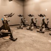 a room with stationary bikes