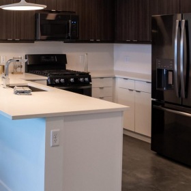 a kitchen with stainless steel appliances